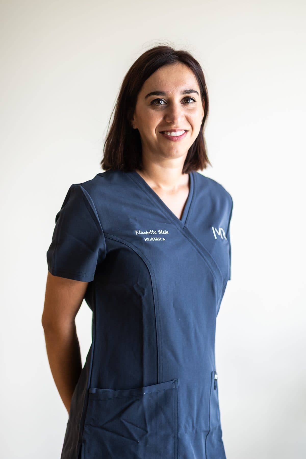 Elisabetta Mela, higienista, sonriendo